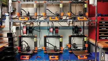 Rows of 3D printers enable MIT engineering students to get a feel for additive manufacturing.
